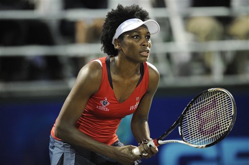 Washington Kastles' Venus Williams awaits the ball during a World Team Tennis women's singles match against the Boston Lobsters Irina Falconi. (AP Photo)