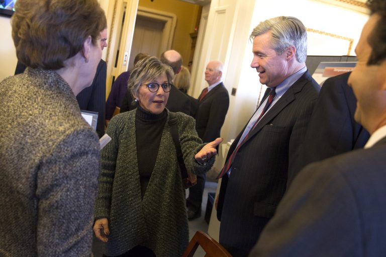 Senate Environment and Public Works Committee Chairman Sen. Barbara Boxer, D-Calif. talks with Senators during a meeting of the Senate Climate Action Task Force prior to taking to the Senate Floor all night to urge action on climate change on Capitol Hill on Monday, March 10, 2014, in Washington. From left,  Sen. Jeanne Shaheen, D-N.H, Boxer, Sen. Sheldon Whitehouse, D-R.I., and Sen. Brian Schatz, D-Hawaii. (AP Photo/ Evan Vucci)