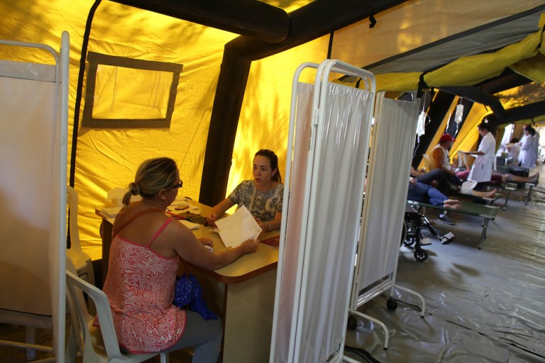 Health officials are examining 14 reports, several of which involve pregnant women. (AP Photo/Eraldo Peres)