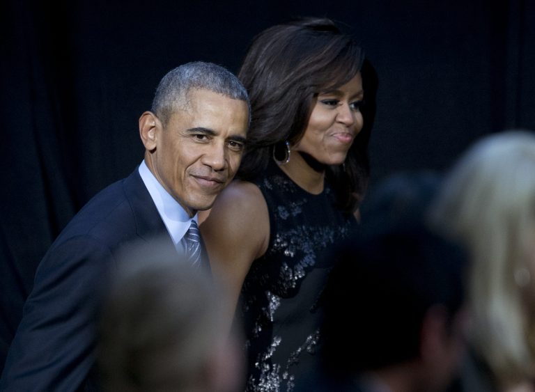 President Barack Obama and first lady Michelle Obama arrive for the International Jazz Day Concert on the South Lawn of the White House of the Washington, Friday, April 29, 2016. (AP Photo/Carolyn Kaster)