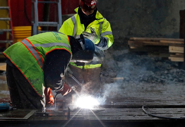 The Bureau reported that gross domestic product was 1.1 percent at an annual rate, less than the 1.2 percent they had initially estimated. (AP Photo/Elise Amendola)