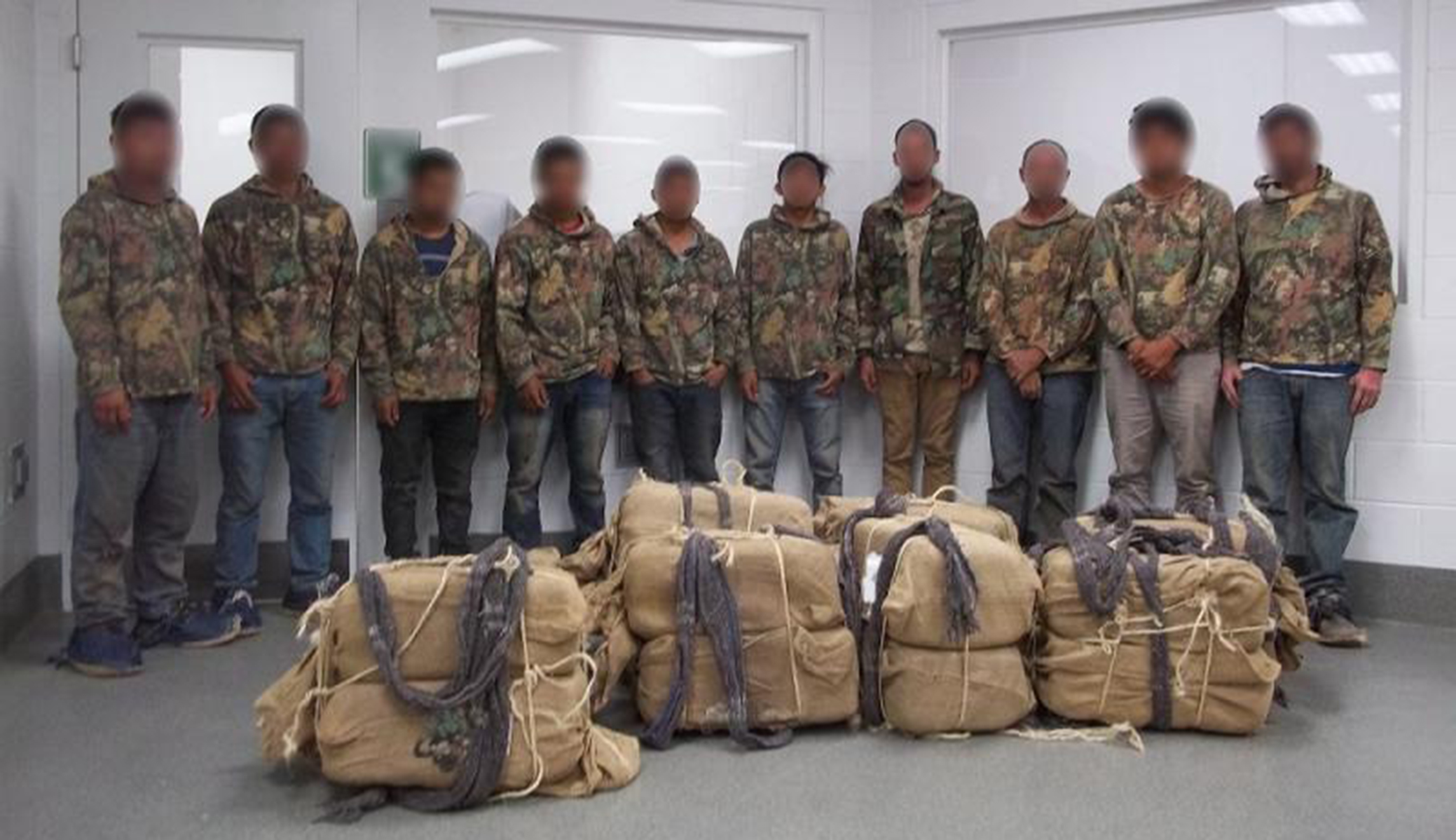 Border Patrol arrests 10 camouflagued drug mules smuggling 390 pounds of pot