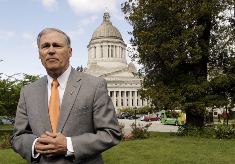 Gov. Inslee has repeatedly sought to block plans to build shipping terminals that would help revive the fortunes of the coal industry in his state. (AP Photo/Rachel La Corte)