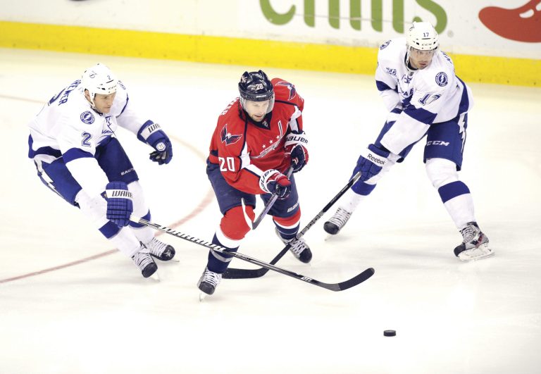 Nick Wass/AP
Troy Brouwer and the Capitals have a four-point lead in the Southeast Division with six games left to play.
