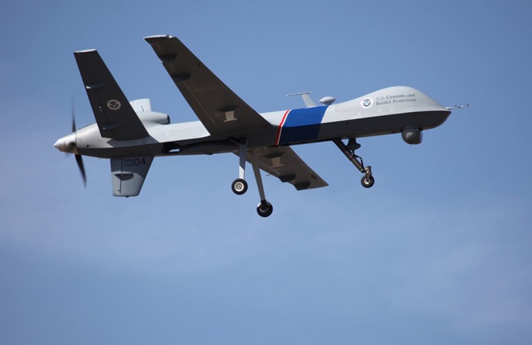 In a photo provided by U.S. Customs and Border Protection, an unmanned drone patrols the U.S.-Canadian border. (AP Photo/U.S. Customs and Border Protection)