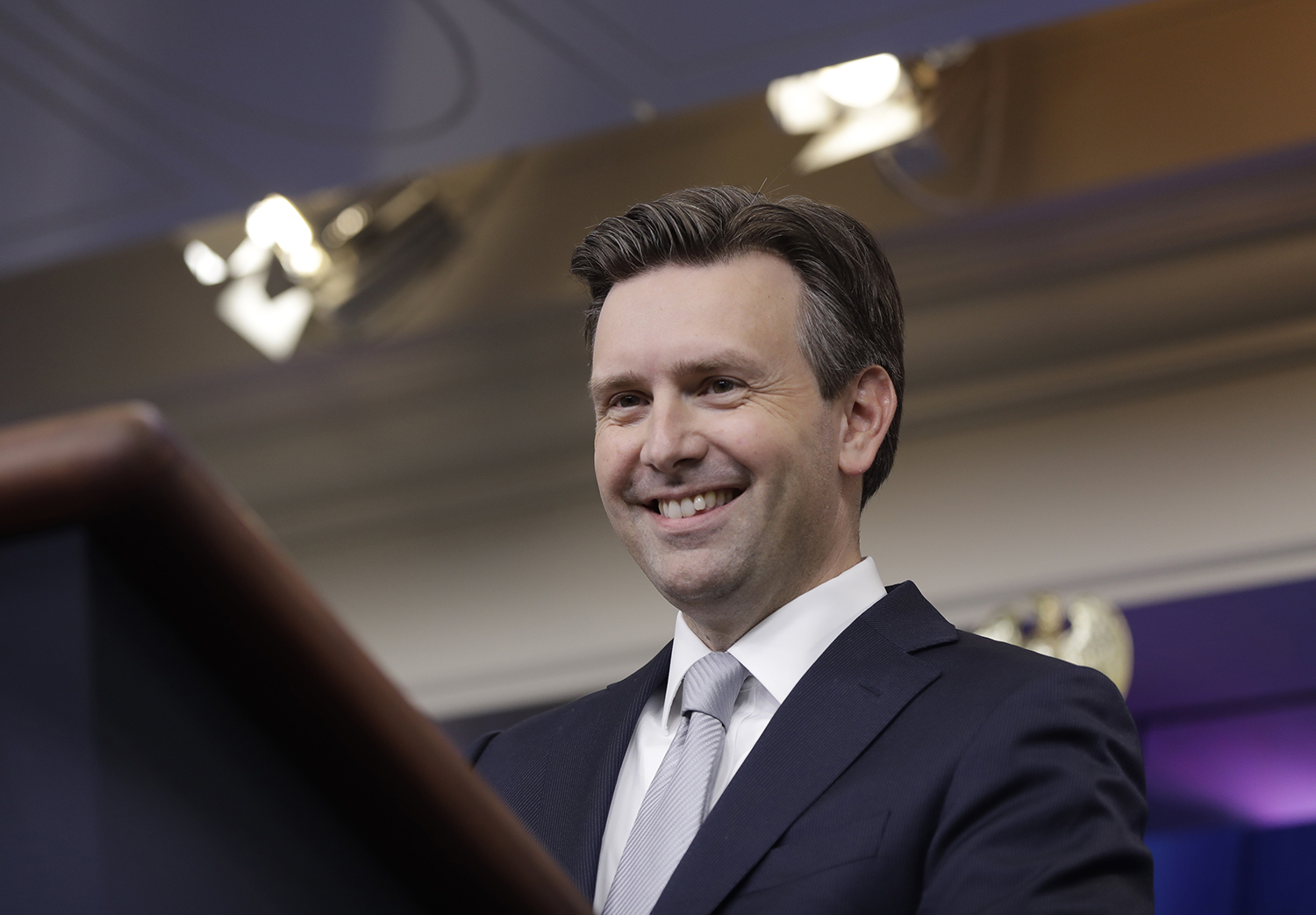 Earnest: Trump’s new hotel is a ‘long way from White House’