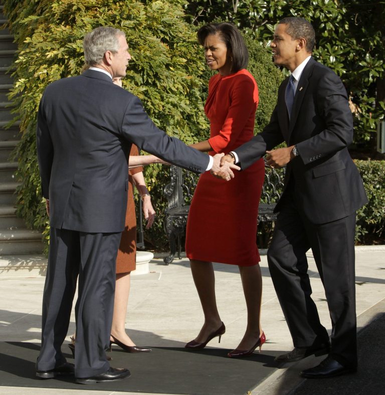 Obama aides fought over how to characterize the November 2008 meeting between the Bushes and Obamas at the White House. (AP Photo/Evan Vucci)