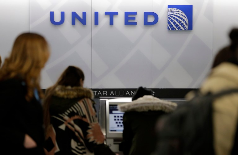 Artificial price caps on compensation for booted passengers encourage airlines to hold their ground. (AP Photo/Seth Wenig)