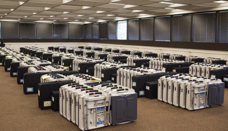 A computer science professor told the Senate Intelligence Committee Wednesday that voting machines that create an electronic record of the voters' decisions are open to fraud and computer hacking. (Ty Wright/Bloomberg)