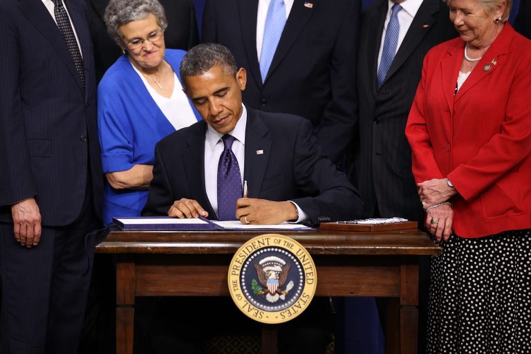President Barack Obama signs the 2012 reauthorization of the Export-Import Bank during an event at the South Court Auditorium at the Eisenhower Executive Office Building of the White House in Washington, D.C. (Getty Images)Â 