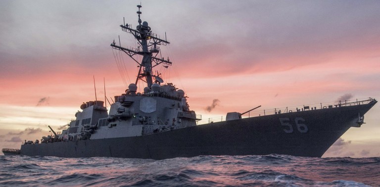 The USS John McCain collided with a merchant ship east of Singapore and the Strait of Malacca, the Navy said.