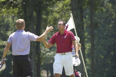 Kevin Dunleavy/The Washington Examiner
Winner Josh Eure of Crofton, right, offered condolences to Sean Bosdosh of Clarksburg after he captured the Maryland Amateur Sunday afternoon at Charwell Golf&Country Club.