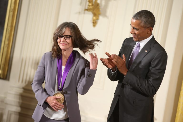 President Barack Obama applauds actress Sally Field after presenting her with the 2014 National Medal of Arts, Thursday, Sept. 10, 2015, in the East Room at the White House in Washington. (AP Photo/Andrew Harkin)
