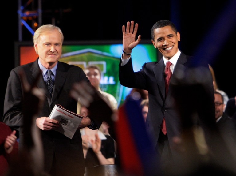 Democratic presidential hopeful, Sen. Barack Obama D-Ill., right, waves to the crowd with 