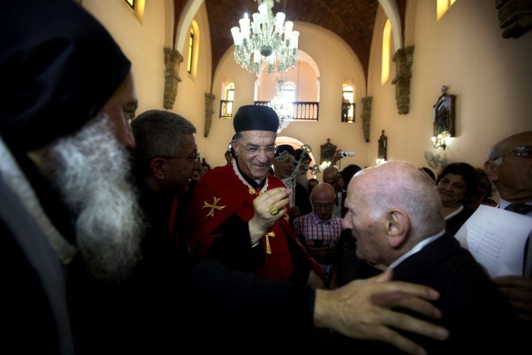 Cardinal Bechara Rai, head of the Maronite Catholic Church, center, visits  a church in Jaffa, a mixed Jewish and Arab neighborhood in Tel Aviv, Israel, Monday, May 26, 2014. The leader of Lebanon's largest Christian denomination visited Jerusalem on Sunday, an official said, making him the first Lebanese religious leader to set foot in the city since Israel captured its traditionally Arab eastern sector in the 1967 Mideast war. (AP Photo/Sebastian Scheiner)