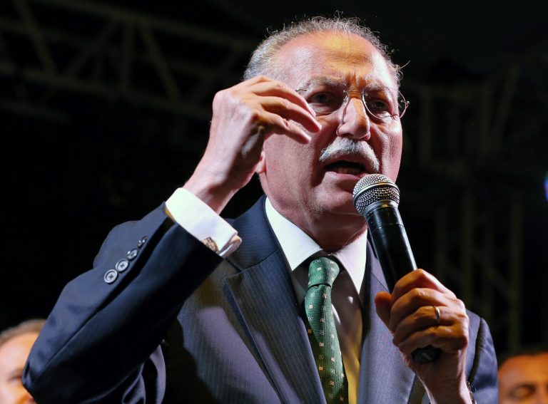 Presidential candidate for upcoming Aug. 10, 2014 election, Professor Ekmeleddin Ihsanoglu, the former head of the Organization of Islamic Cooperation, addresses a rally in Ankara, Turkey, late Monday, Aug. 4, 2014. Ihsanoglu, who is supported by nearly all opposition parties, has highlighted creditentials as a champion of the Palestinians' cause, national unity as 