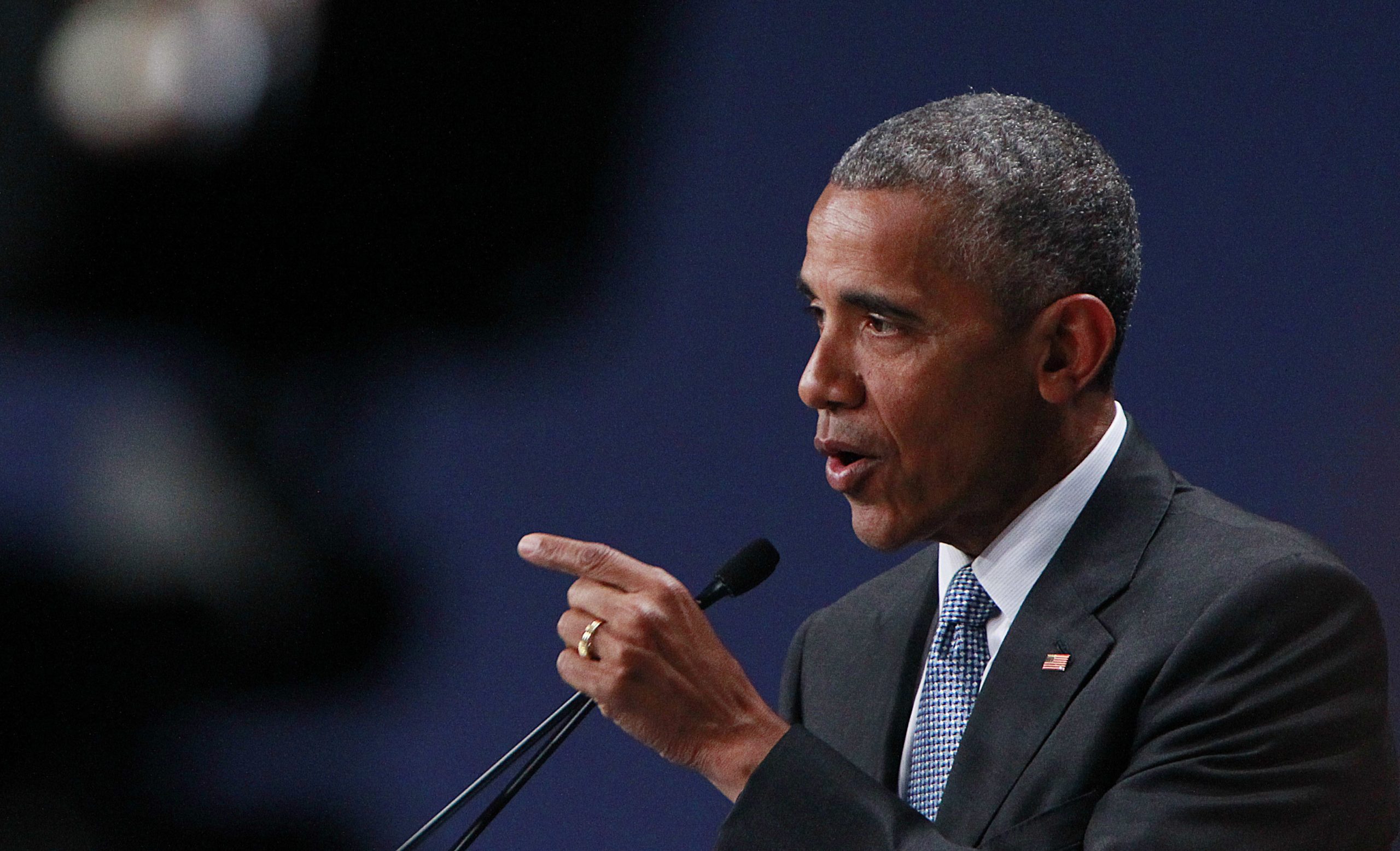 Obama: Legal guns drive wedge between cops and communities
