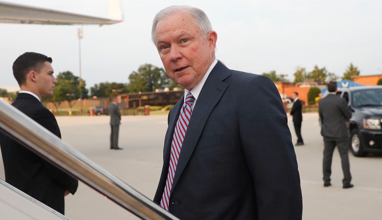 Attorney General Jeff Sessions boards his plane at Andrews Air Force Base, Md., Thursday, July 27, 2017. With his future as the nation's top prosecutor in doubt after a week of blistering public scorn from the president, Sessions is traveling to El Salvador to seek ways to stamp out the brutal street gang MS-13. (AP Photo/Pablo Martinez Monsivais)