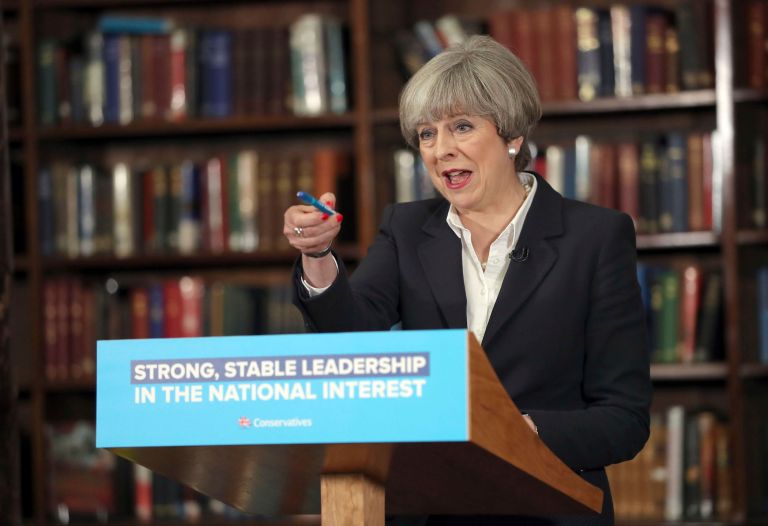 For a public in fear, perceptions of a leader's strength make all the difference. (Andrew Matthews/PA via AP)