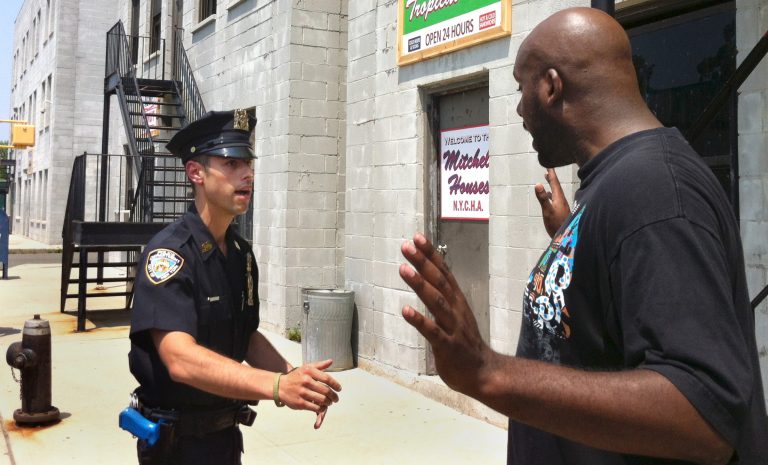 Det. Anthony Mannuzza, left, and Police Officer Robert Martin, right, simulate a street stop during a training session at the New York Police Department's training facility on June 20, 2012. (AP File)