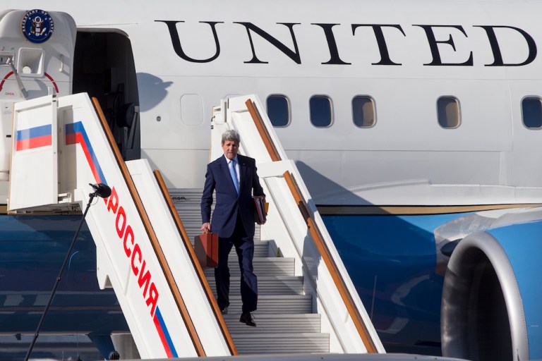 He beat Condoleezza Rice by 1,000 miles. (AP Photo/Pavel Golovkin)