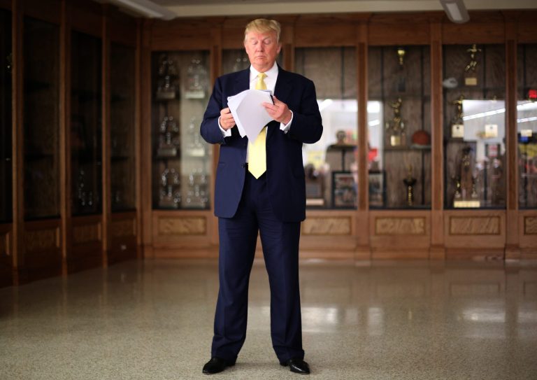 Republican presidential candidate Donald Trump prepares to speak from a cafeteria at Winterset High School during a campaign stop in Winterset, Iowa, Saturday, June 27, 2015. (Bryon Houlgrave/The Des Moines Register via AP)