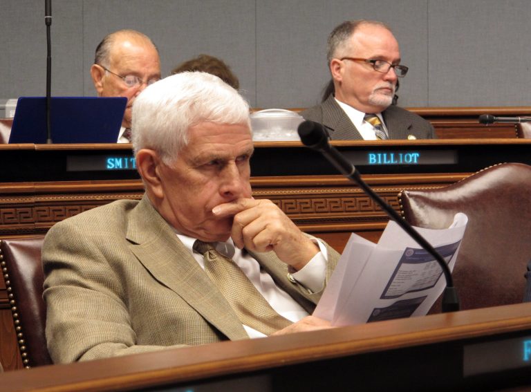 Rep. Rogers Pope, R-Denham Springs, reviews the Louisiana Gov. Bobby Jindal's budget proposal on Tuesday, March 11, 2014, in Baton Rouge, La. The House Appropriations Committee started its hearings on Jindal's spending recommendations for next year on Tuesday. (AP Photo/Melinda Deslatte)