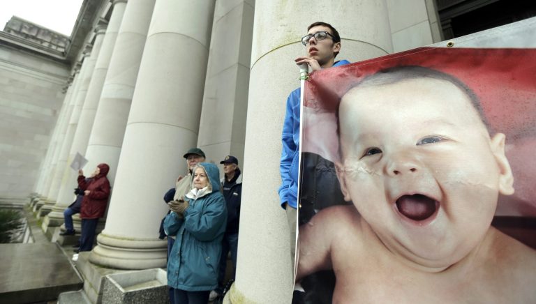 While we grapple with the political fights in Washington, D.C., we're grateful for every life-affirming, hope-filled, nonpolitical conversation Americans have around family dinner tables, during work hours and in casual conversations with friends. (AP Photo)