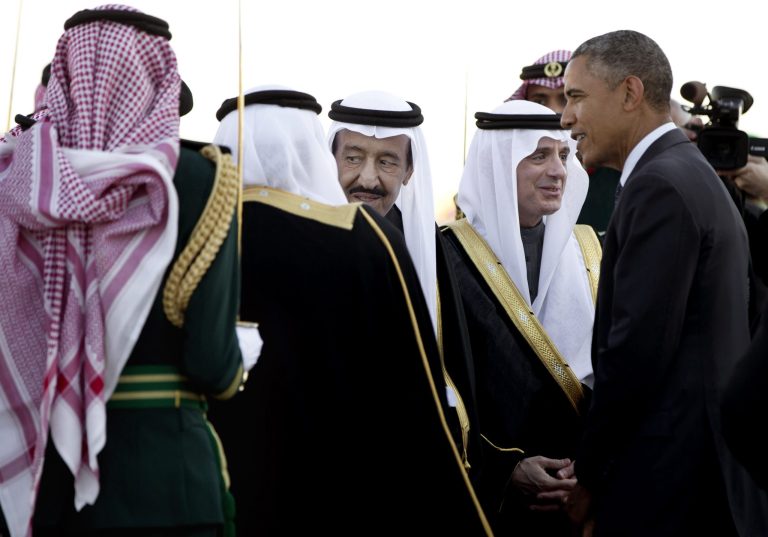 In this Jan. 27, 2015 file photo, President Obama is greeted by new Saudi King Salman bin Abdul Aziz. It is not just the Saudi king who will be skipping the Camp David summit of U.S. and allied Arab leaders. Many Gulf heads of state won't be there. (AP Photo/Carolyn Kaster, File)