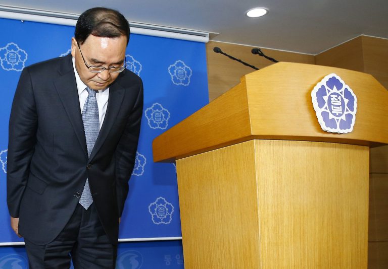 South Korean Prime Minister Chung Hong-won bows to the nation after offering his resignation at the Central Government Complex in Seoul, South Korea, Sunday, April 27, 2014. Chung offered to resign Sunday over the government's handling of a deadly ferry sinking, blaming 