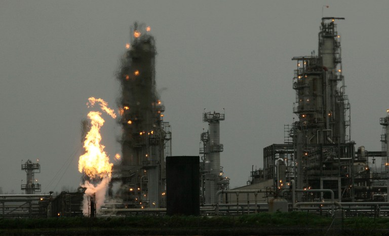 The Koch brothers joined the attack Friday as environmental groups stepped up their eleventh-hour campaign to kill Initiative 732, which would establish the first tax on carbon pollution in the nation. (AP Photo/Ted S. Warren, File)