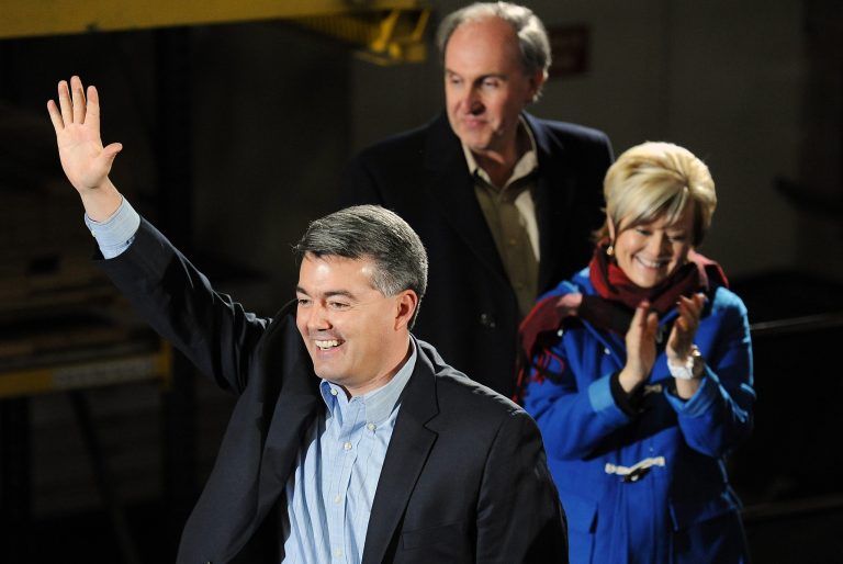 Colorado Republican Rep. Cory Gardner waves to supporters at an event to officially announce his candidacy for the U.S. Senate at Denver Lumber Company on March 1 in Denver. (AP Photo/Chris Schneider)