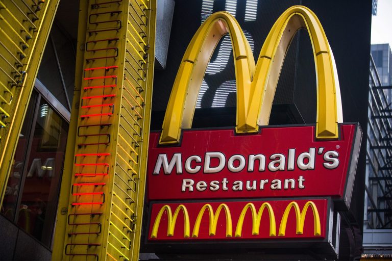 A sign for a McDonald's restaurant is seen in Times Square on June 9, 2014 in New York City. (Photo by Andrew Burton/Getty Images)
