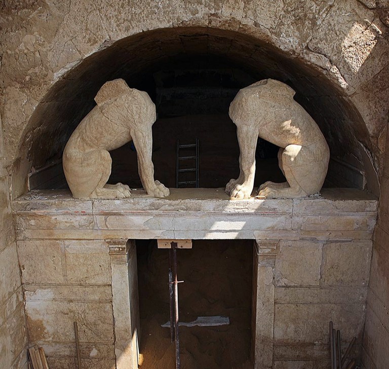 In this handout photo released by the Greek Culture Ministry on Monday, Aug. 25, 2014, two battered marble sphinxes are seen under a barrel-vault topping the entrance to a late 4th Century B.C. tomb under excavation at Amphipolis in northern Greece. Archaeologists excavating the large grave mound have partially investigated the interior of the underground tomb _ which appears to have lacked a door in the doorway under the sphinxes _ the ministry said Monday. But it seems most likely that the tomb was plundered in antiquity. (AP Photo/Culture Ministry, HO)