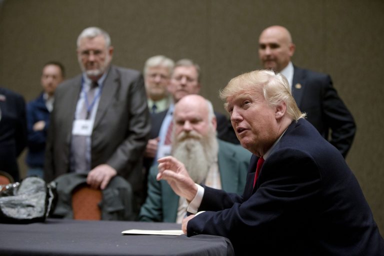 Republican presidential candidate Donald Trump meets with veterans and their families ahead of a campaign event in North Charleston, S.C. (AP Photo/Matt Rourke)
