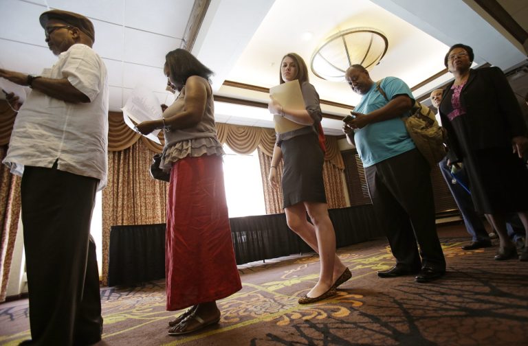 In this Thursday, June 12, 2014 photo, people wait in line for the Cleveland Career Fair in Independence, Ohio. U.S. employers accelerated their hiring in June, adding a robust 288,000 jobs and helping drive the unemployment rate to 6.1 percent, the lowest since September 2008, the Labor Department reported, Thursday, July 3, 2014. (AP Photo/Tony Dejak)