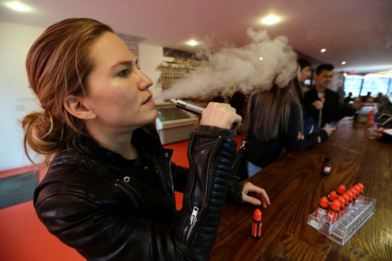 Efforts to stop young people vaping may backfire and lead to an increase in youth cigarette smoking. (AP Photo/Frank Franklin II, File)