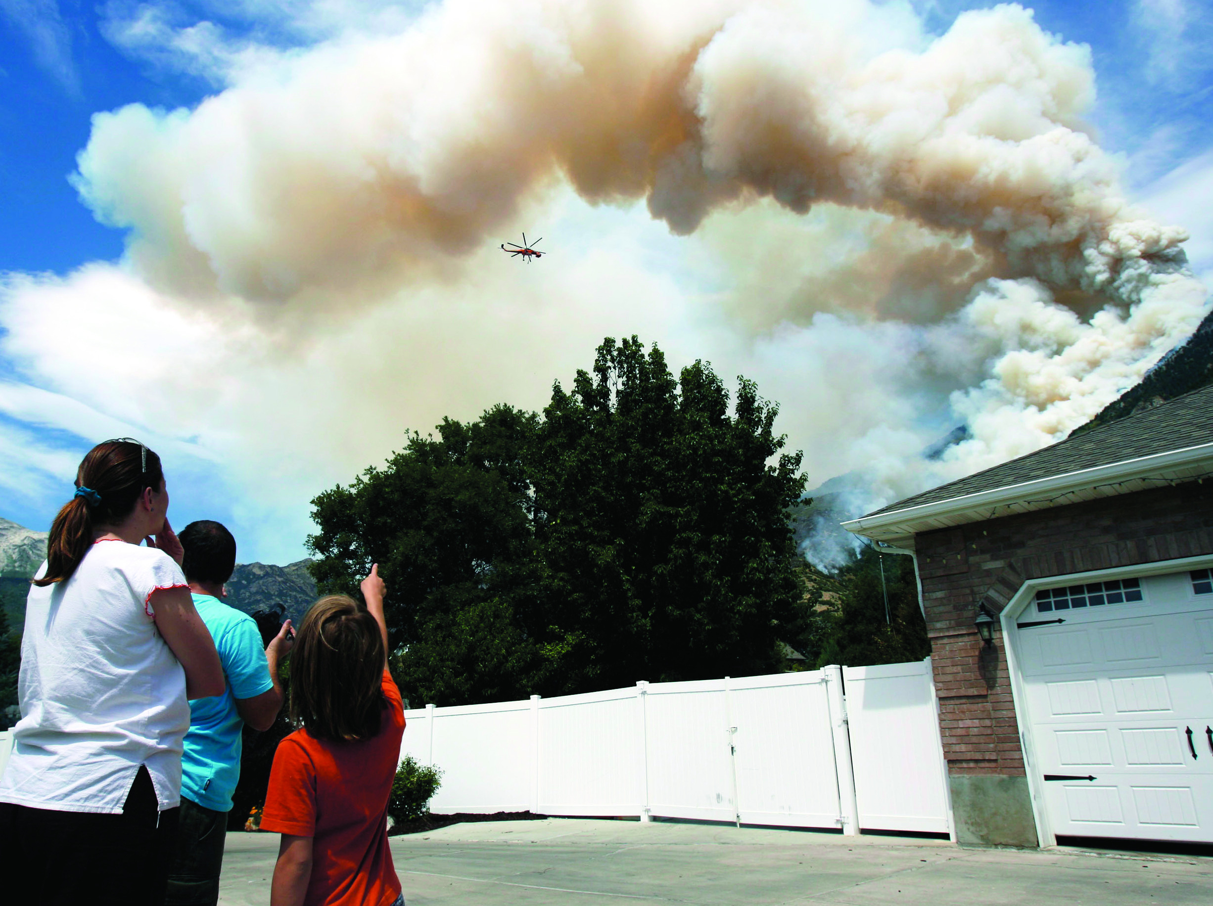 Moderating weather helps Western fire crews
