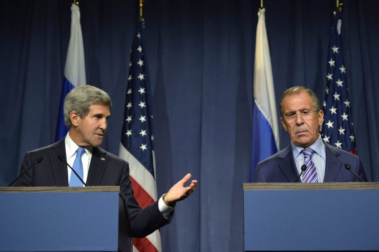 Secretary of State John Kerry speaks next to Russian Foreign Minister Sergey Lavrov, right, during a press conference before their meeting to discuss the ongoing crisis in Syria, in Geneva, Switzerland, on Thursday, Sept. 12. (AP Photo/Keystone, Martial Trezzini)
