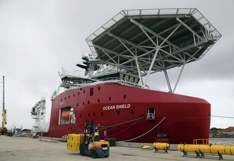 FILE - In this March 30, 2014 file photo, Australian Defense ship Ocean Shield is docked at naval base HMAS Stirling while being fitted with an autonomous underwater vehicle (AUV) and towed pinger locator to aid in the search for missing Malaysia Airlines Flight MH370, in Perth, Australia. A U.S. Navy spokesman on Thursday, May 29, 2014 dismissed as 