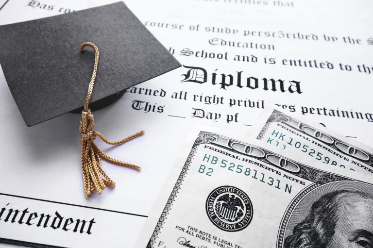 In a survey of Americans' personal financial situations released by the Federal Reserve Thursday, nearly half of the respondents who majored in computer science or information science said that the costs of college outweighed the benefits. (iStock Photo)