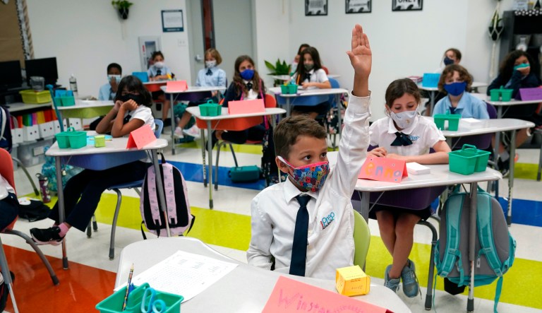 Biden officials step up pressure to use infection control measures in schools