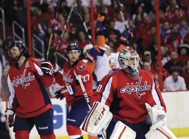 Alex Brandon/AP
Goalie Braden Holtby allowed a tie-breaking goal with 5:18 left that ended up being the difference in Washington's loss to New York.