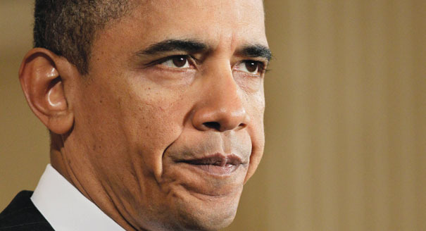 A House Ways and Means Committee is probing the president's decision to delay a key element of Obamacare. AP Photo.