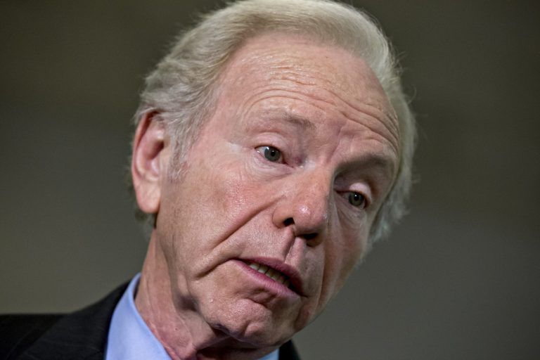 Then-Sen. Joseph Lieberman of Connecticut speaks with reporters on Capitol Hill in Washington in November 2012. (AP Photo/J. Scott Applewhite)