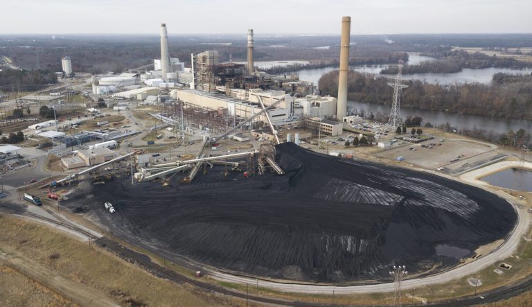 Trump has boasted that coal production is up since he took office. But the Energy Department's analysis arm showed that it has mostly ebbed and flowed all year, with a huge drop occurring over the holidays. (AP Photo/Steve Helber)