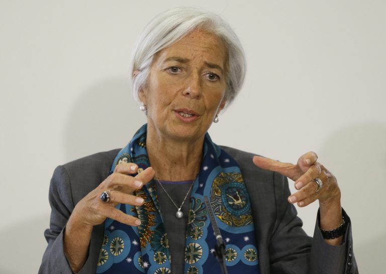 FILE - In this June 6, 2014 file photo, International Monetary Fund (IMF) Managing Director Christine Lagarde speaks at a press conference at the HM Treasury in London.  The International Monetary Fund issues its annual assessment of the U.S. economy on Monday, June 16, 2014. (AP Photo/Kirsty Wigglesworth, File)