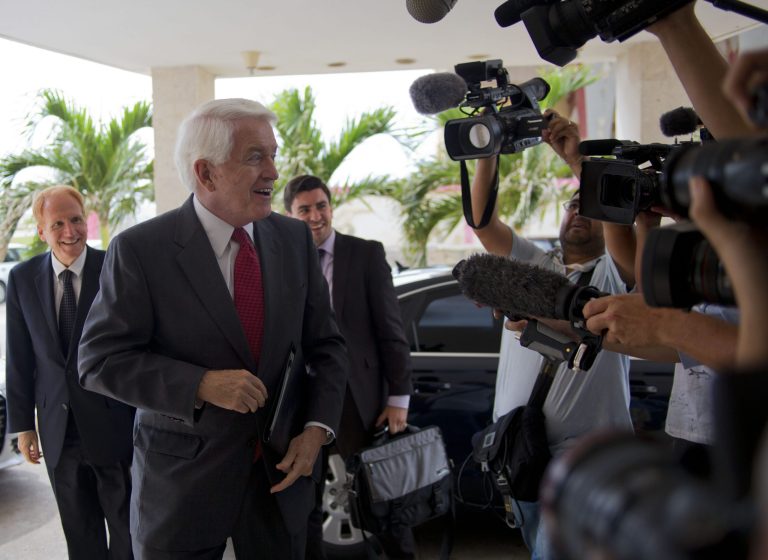 U.S. Chamber of Commerce President and CEO Thomas Donohue, second left, talks with the press before a meeting with Cuba's Foreign Minister Bruno Rodriguez, in Havana, Cuba, Tuesday, May 27, 2014. A U.S. Chamber of Commerce Delegation arrived today to Cuba to explore the business climate at the island. (AP Photo/Ramon Espinosa)