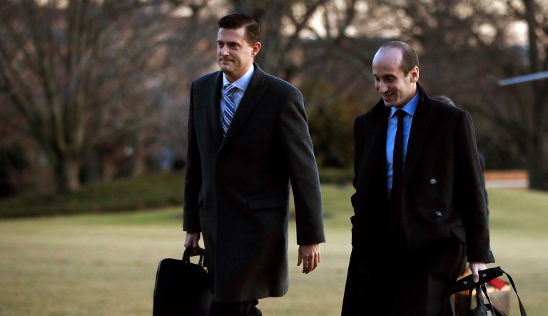 White House press secretary Sarah Sanders initially told reporters Wednesday staff secretary Rob Porter's (pictured left) resignation would not be immediate to ensure a 