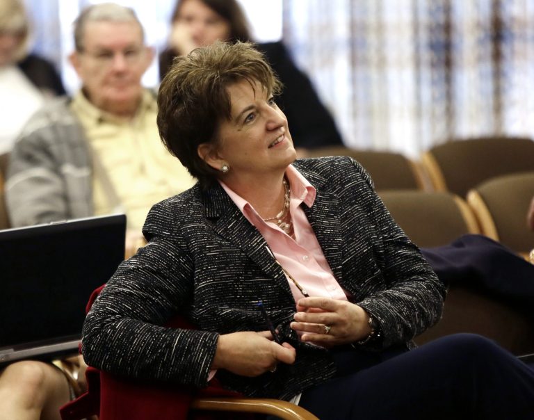 Oregon Health Authority Chief Information Officer Carolyn Lawson is shown before appearing at a Joint Interim Committee on Legislative Audits, Information Management and Technology in Salem, Ore., on Nov. 20.  Lawson announced last week that she was resigning for personal reasons. (AP Photo/Don Ryan)
